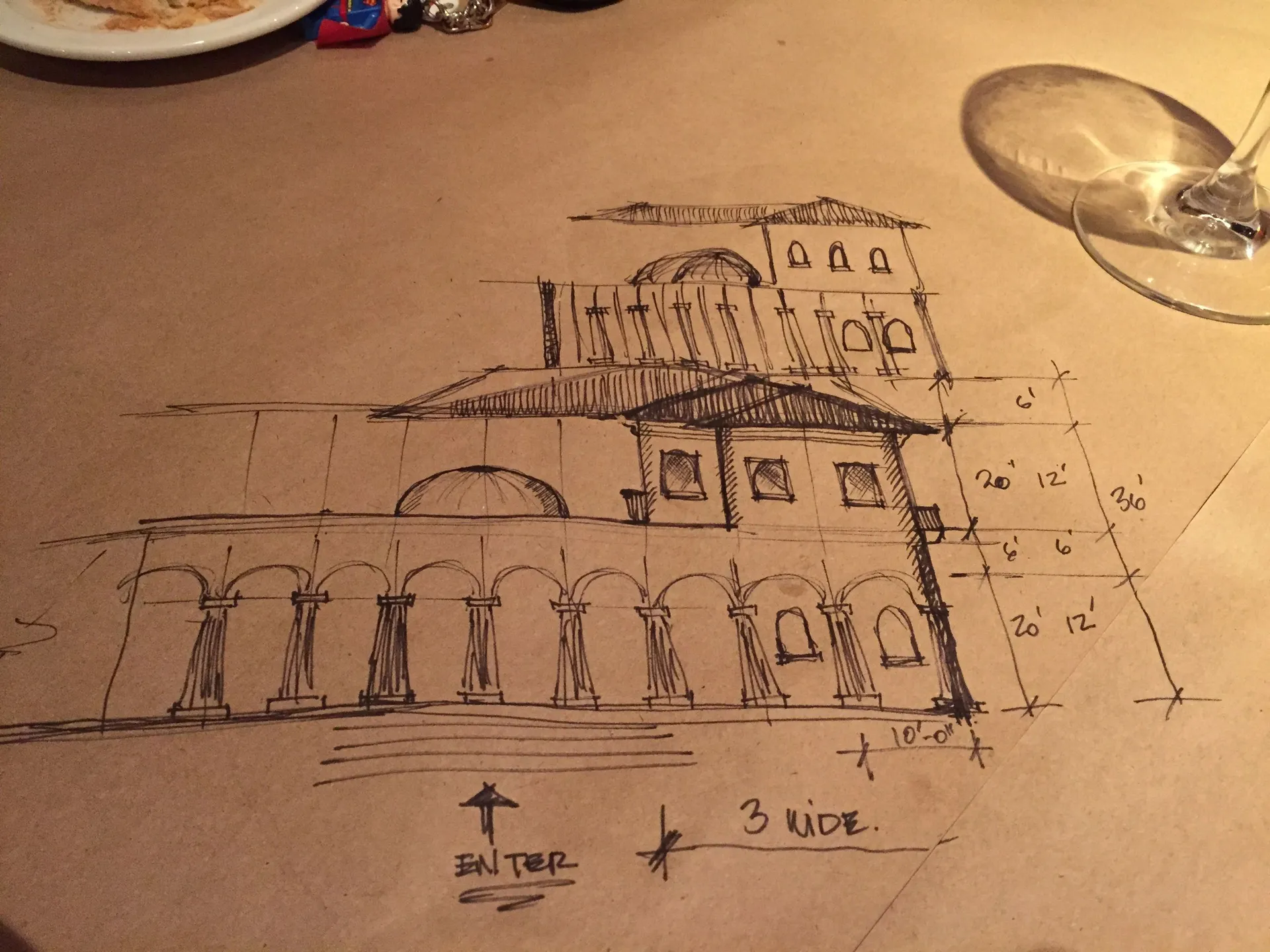 An architectural sketch explores the first idea on paper.